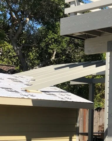 Home addition roofing and exterior work in progress