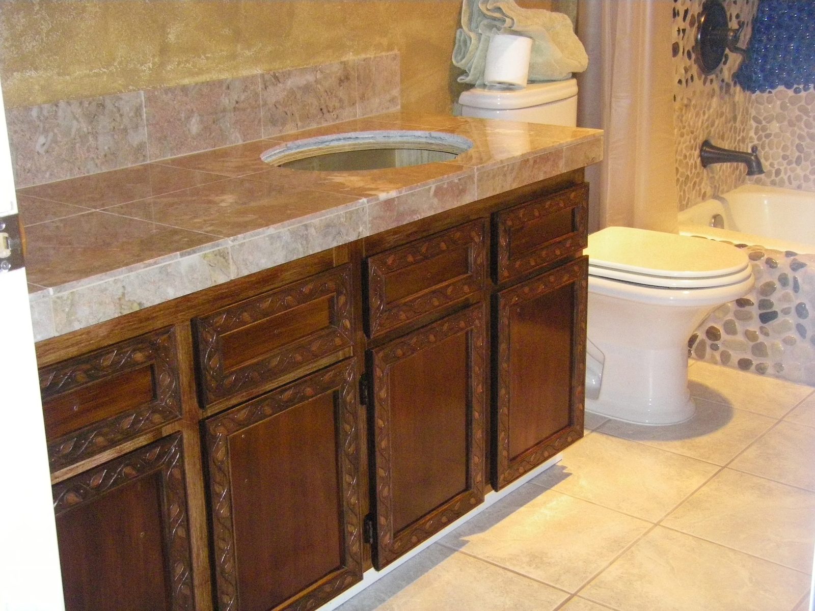 Bathroom renovation detail showing tile border