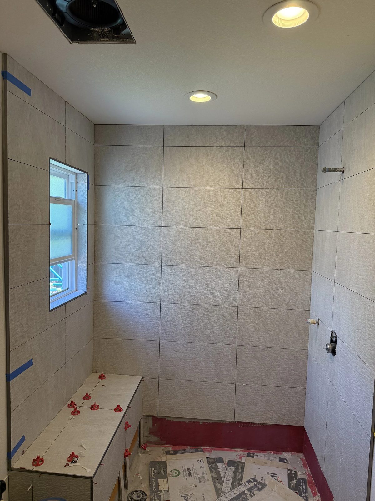 Completed bathroom renovation with new fixtures