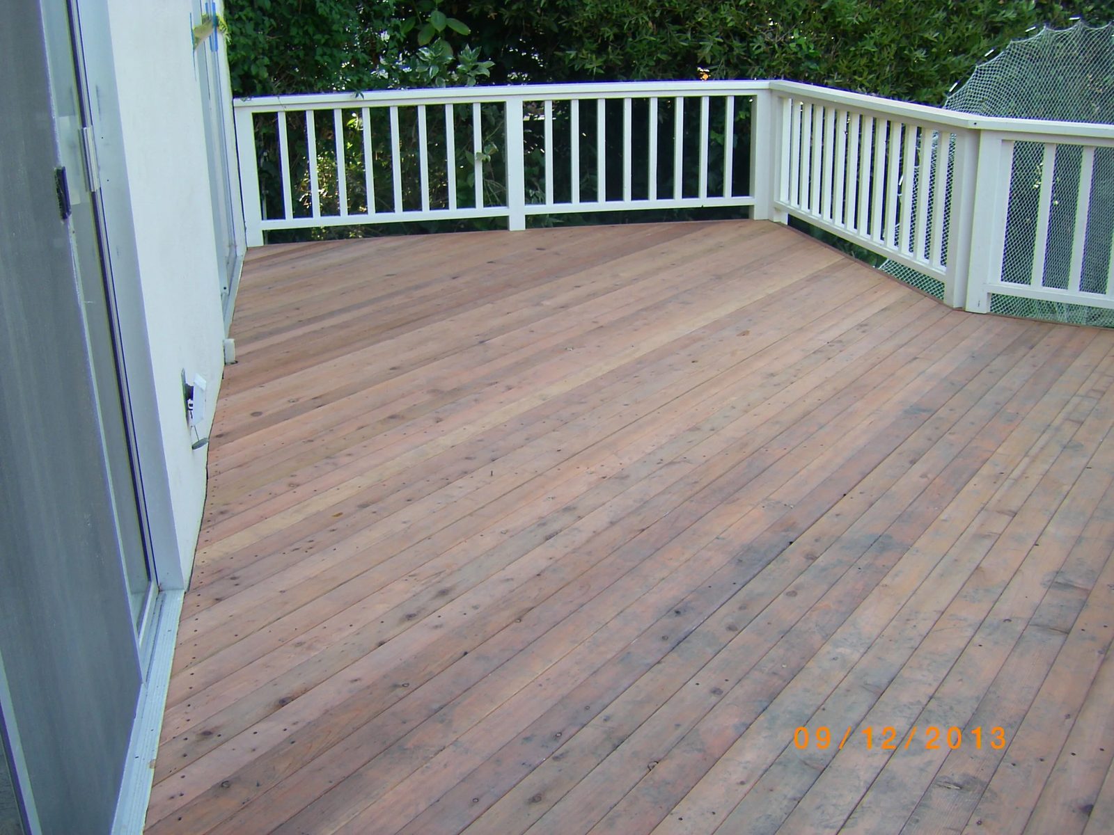 Finished deck with steps leading to yard