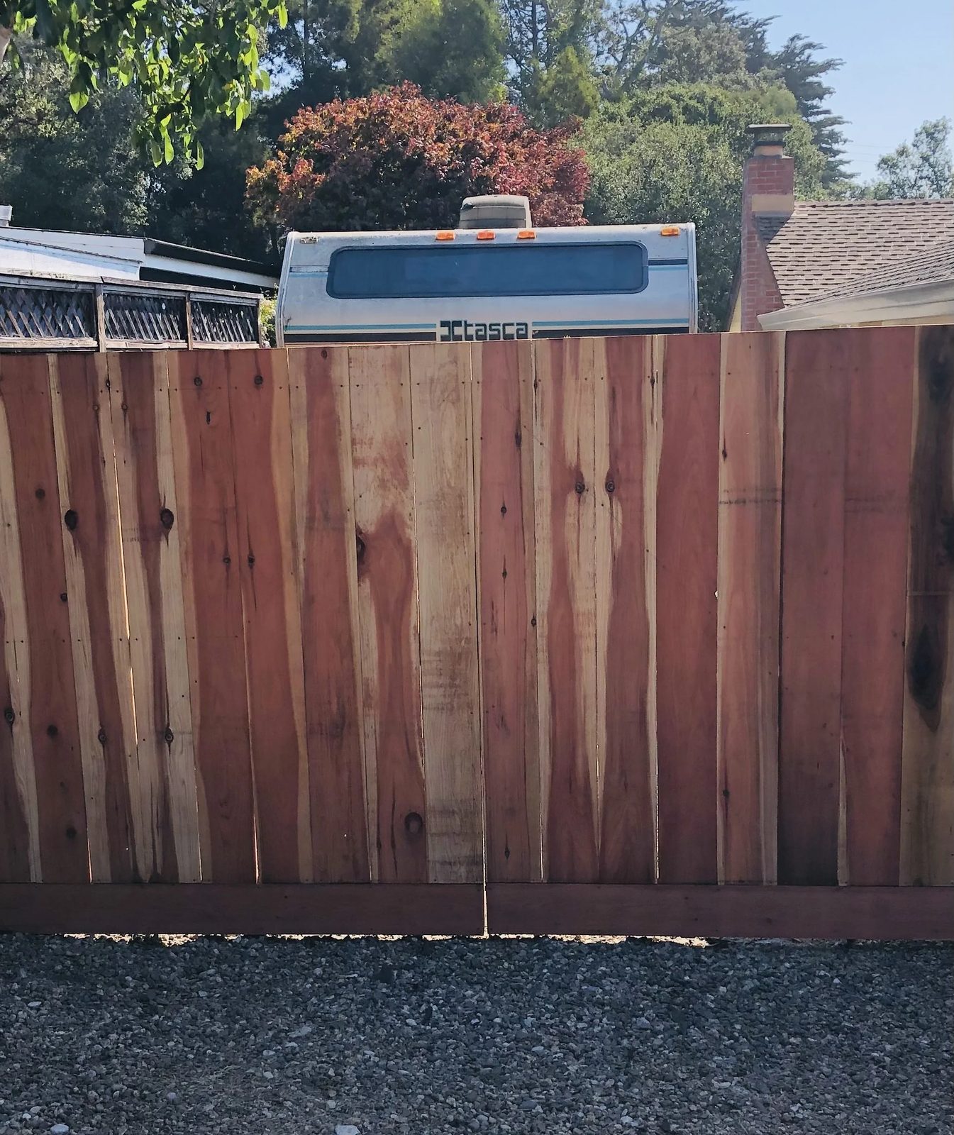 Privacy fence installation along residential property line