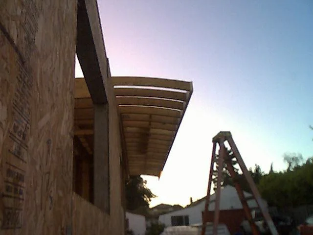 Structural framing with temporary bracing