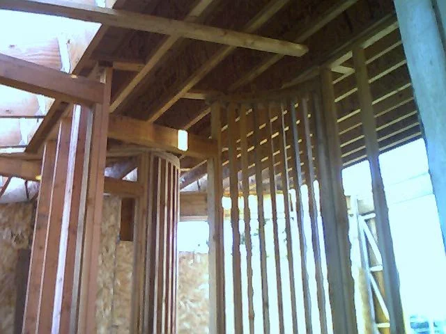 Framing work showing stairway opening
