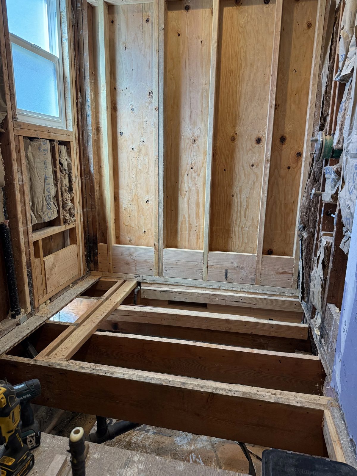 Roof framing and sheathing installation