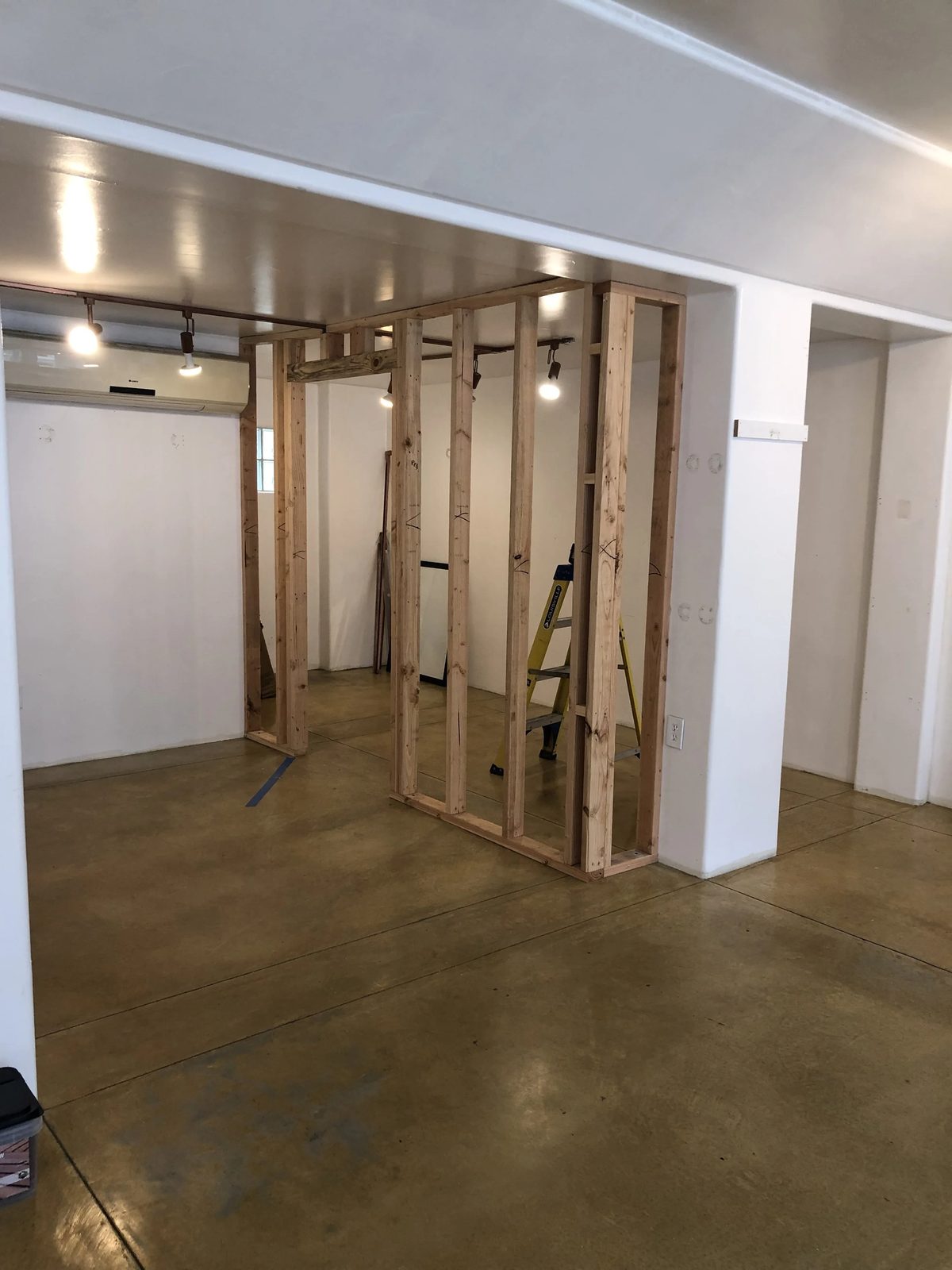 Wall framing showing header beams