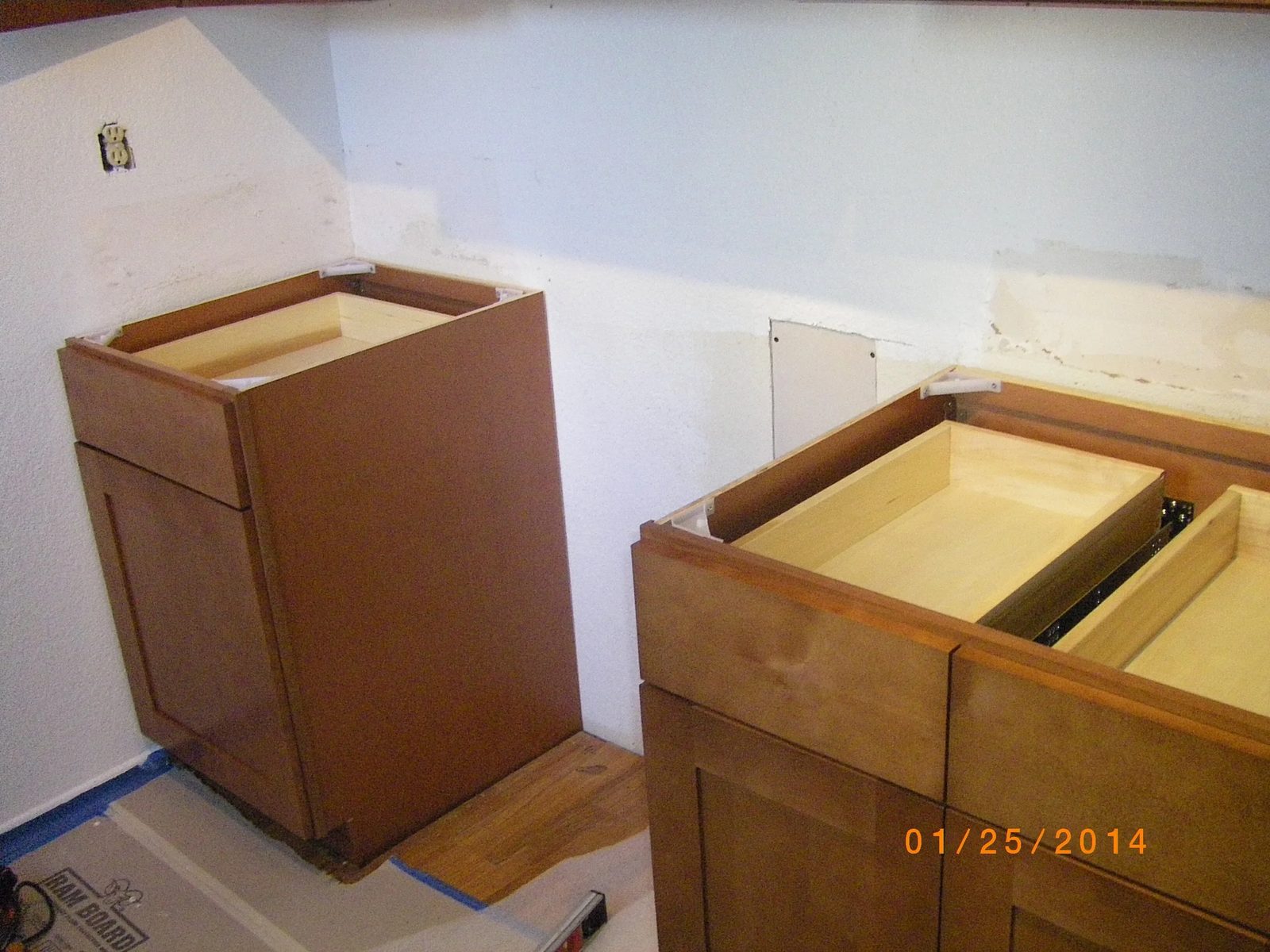 Kitchen cabinet installation by Aboveboard Construction