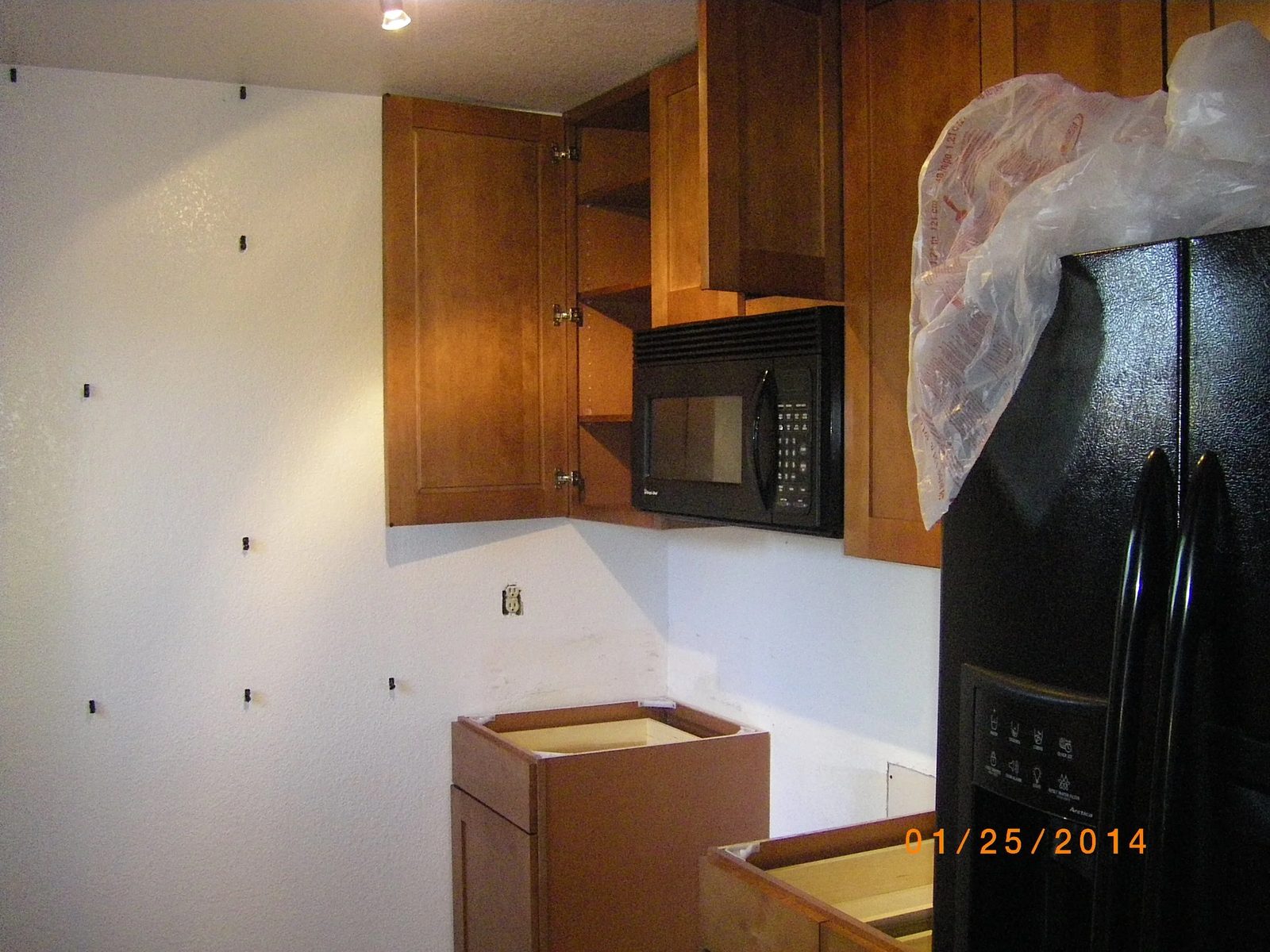Renovated kitchen with new cabinetry and fixtures