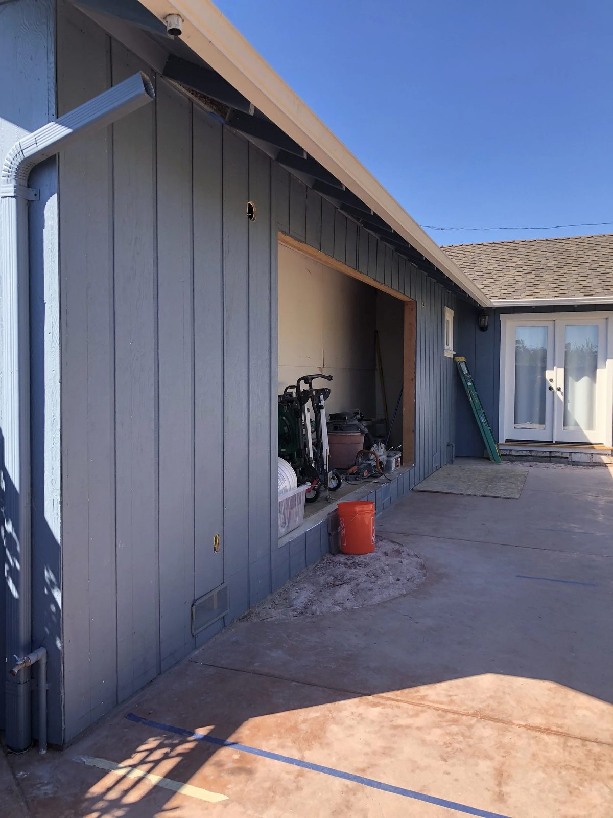 Completed siding project by Aboveboard Construction